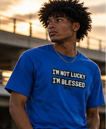 Wearing a JESUSWEAR21 tee